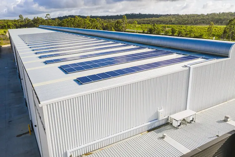 Aerial view of a 280kW solar panel installation on the World Gym commercial building roof